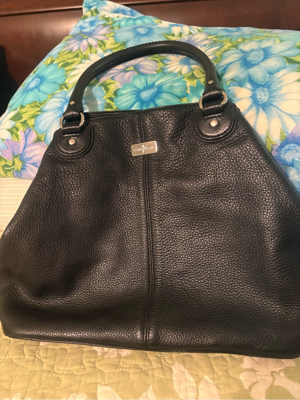 Black Pebbled leather Cole Haan tote.  Will fit laptop.